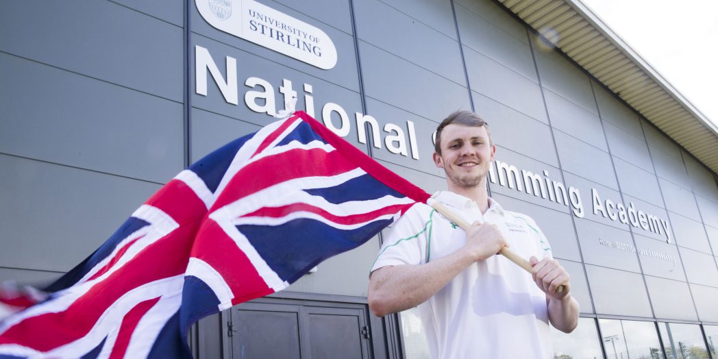 Ross Murdoch holding GB flag at Stirling University