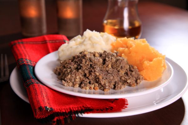 Image of a traditional Burns supper of haggic, potatoes and turnips.