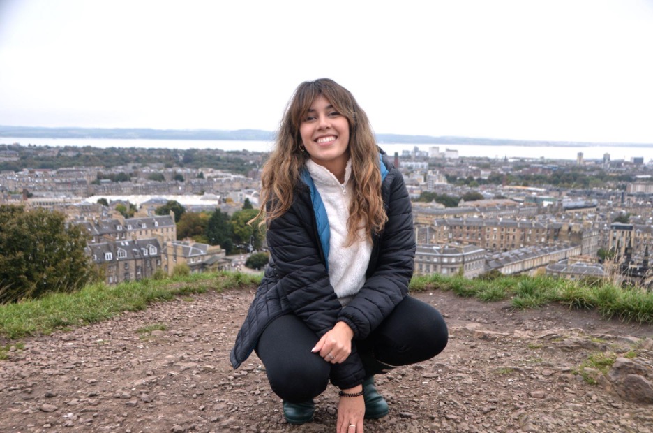 Student posing infront of Edinburgh