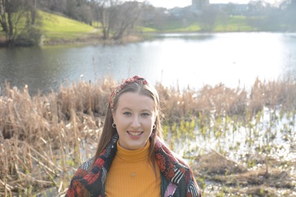 Student Emily infront of Airthrey Loch