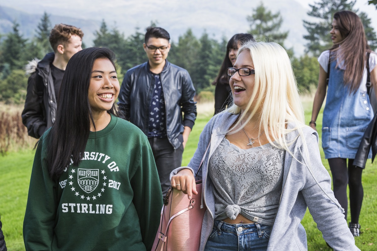 A group of students walking on campus